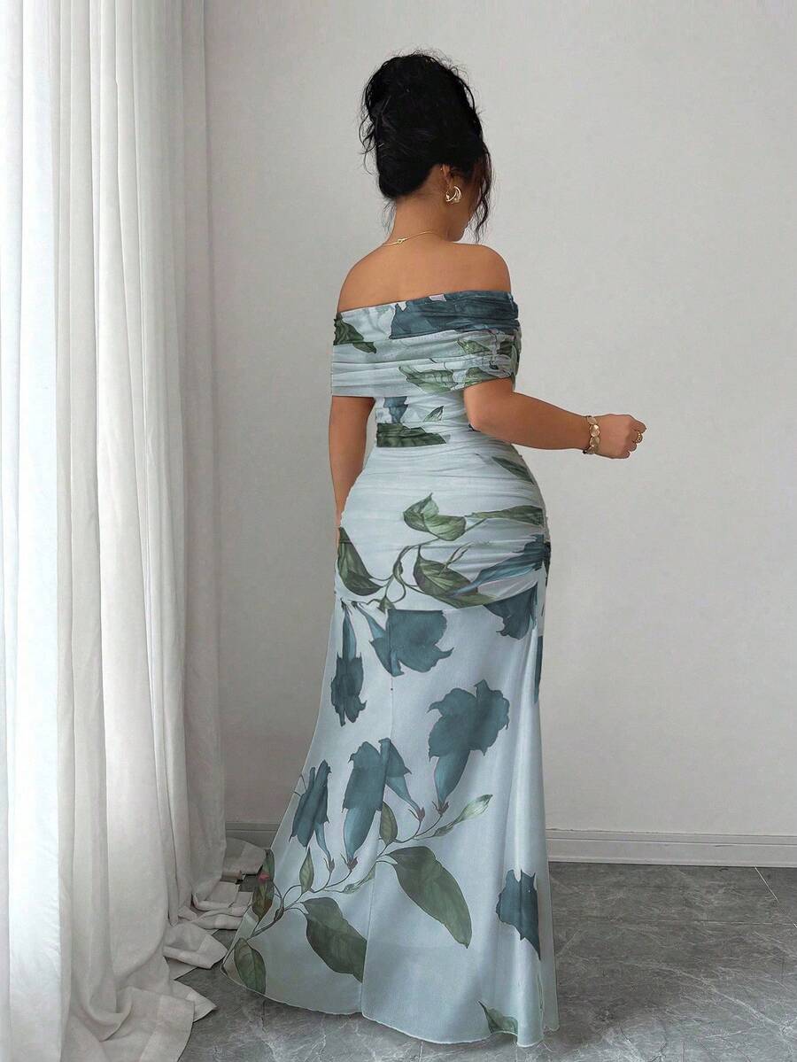 Make a statement in this show-stopping plus-size evening dress that celebrates your curves with style. The off-shoulder neckline creates an effortlessly chic silhouette, while strategic ruching flatters your figure beautifully. Delicate mesh print detailing adds visual interest and sophistication to every angle. Perfect for galas, weddings, or any occasion where you want to feel absolutely fabulous. Slip into confidence and let your elegance do the talking.