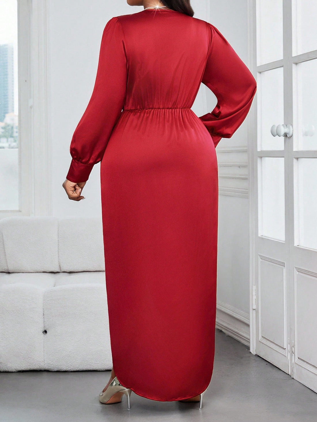 Wrap yourself in sophistication this season! This stunning burgundy maxi dress features a flattering V-neckline and elegant long sleeves, perfect for fall celebrations and special occasions. The wrapped silhouette creates a graceful, slimming effect while the rich wine tone adds timeless glamour to any event. Designed for plus-size figures, it offers comfort without compromising on style. Whether you're heading to a wedding or autumn gathering, this dress delivers the polish and poise you deserve—because lo