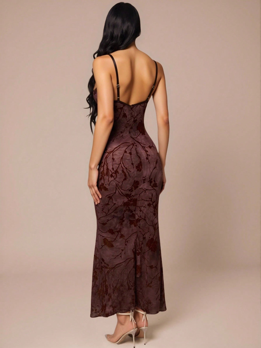 Slip into sophistication with this stunning velvet floral dress that's ready to turn heads at any event. The delicate spaghetti straps and flattering deep V-neckline create an effortlessly chic silhouette, while the luxurious velvet fabric adds a touch of glamour and texture. Whether you're heading to a dinner date, cocktail party, or special celebration, this versatile piece transitions seamlessly from day to night. The intricate floral pattern brings a romantic flair that feels both timeless and on-trend.