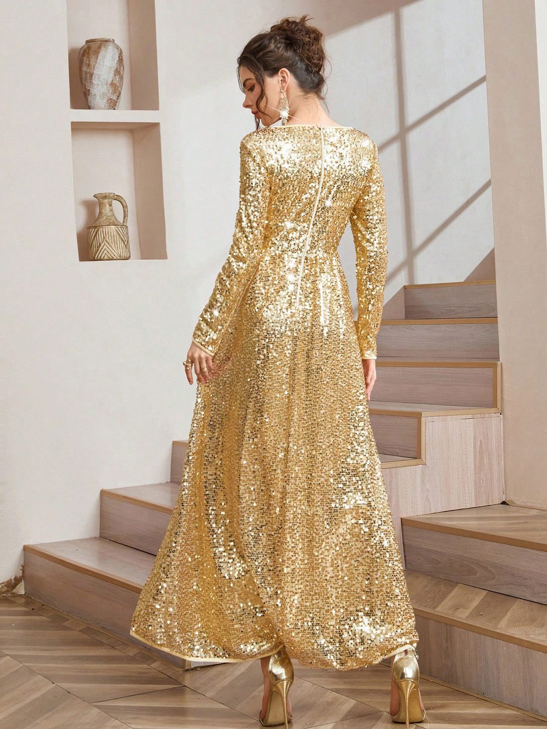 Shimmer into the season with this stunning gold party dress that's ready to steal the spotlight at every holiday gathering. The asymmetric hem adds a modern twist to timeless elegance, while long sleeves keep you cozy through festive celebrations. Whether you're dancing at a Christmas cocktail party or toasting to the new year, this dress delivers sophisticated style with just a hint of playful flair. Perfect for anyone who wants to look absolutely radiant without taking themselves too seriously.