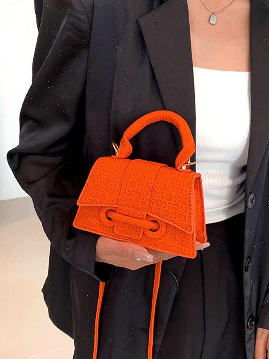 This compact drawstring lock bag combines contemporary design with practical functionality, making it an ideal accessory for professionals and young women on the move. The structured square silhouette offers a modern aesthetic while the secure drawstring closure with lock detail ensures your essentials stay protected throughout the day. Crafted with attention to detail, this handbag transitions seamlessly from office to casual outings, providing sophisticated style without compromising on everyday usability