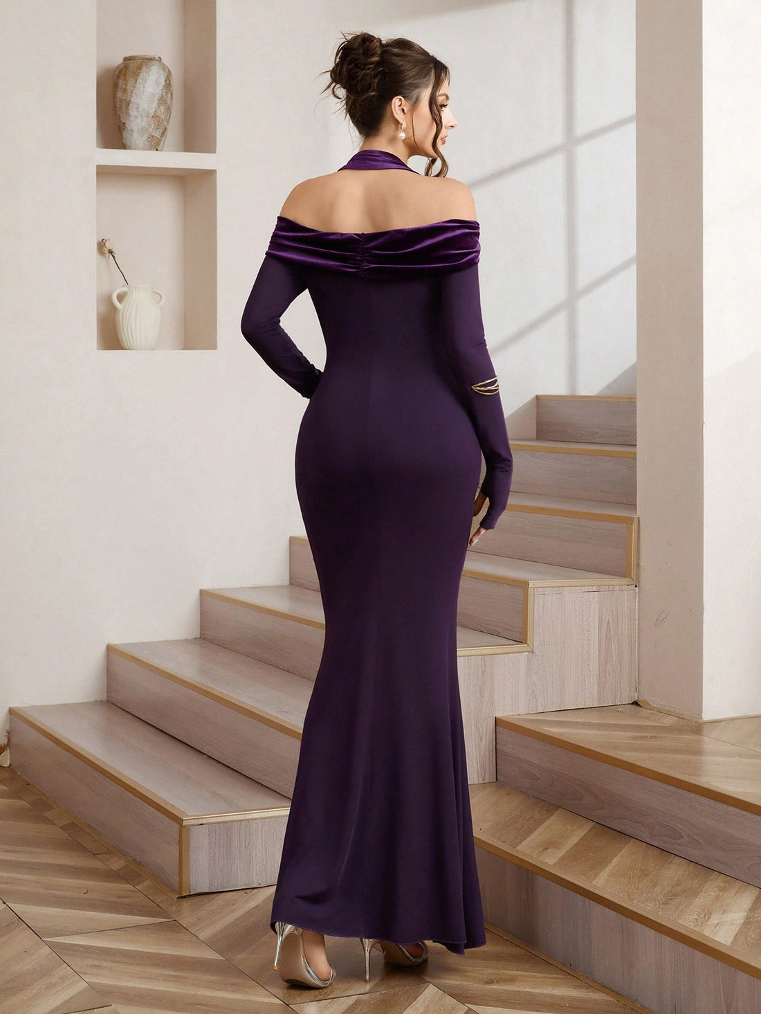 Step into the spotlight in this show-stopping velvet fishtail dress! The halter neckline frames your shoulders beautifully while long sleeves add an air of vintage sophistication. The dramatic fishtail hem creates a graceful silhouette that's perfect for formal galas, cocktail parties, or any occasion where you want to turn heads. Luxuriously soft velvet fabric drapes elegantly against your skin, ensuring you feel as fabulous as you look. Whether you're dancing the night away or making a grand entrance, thi