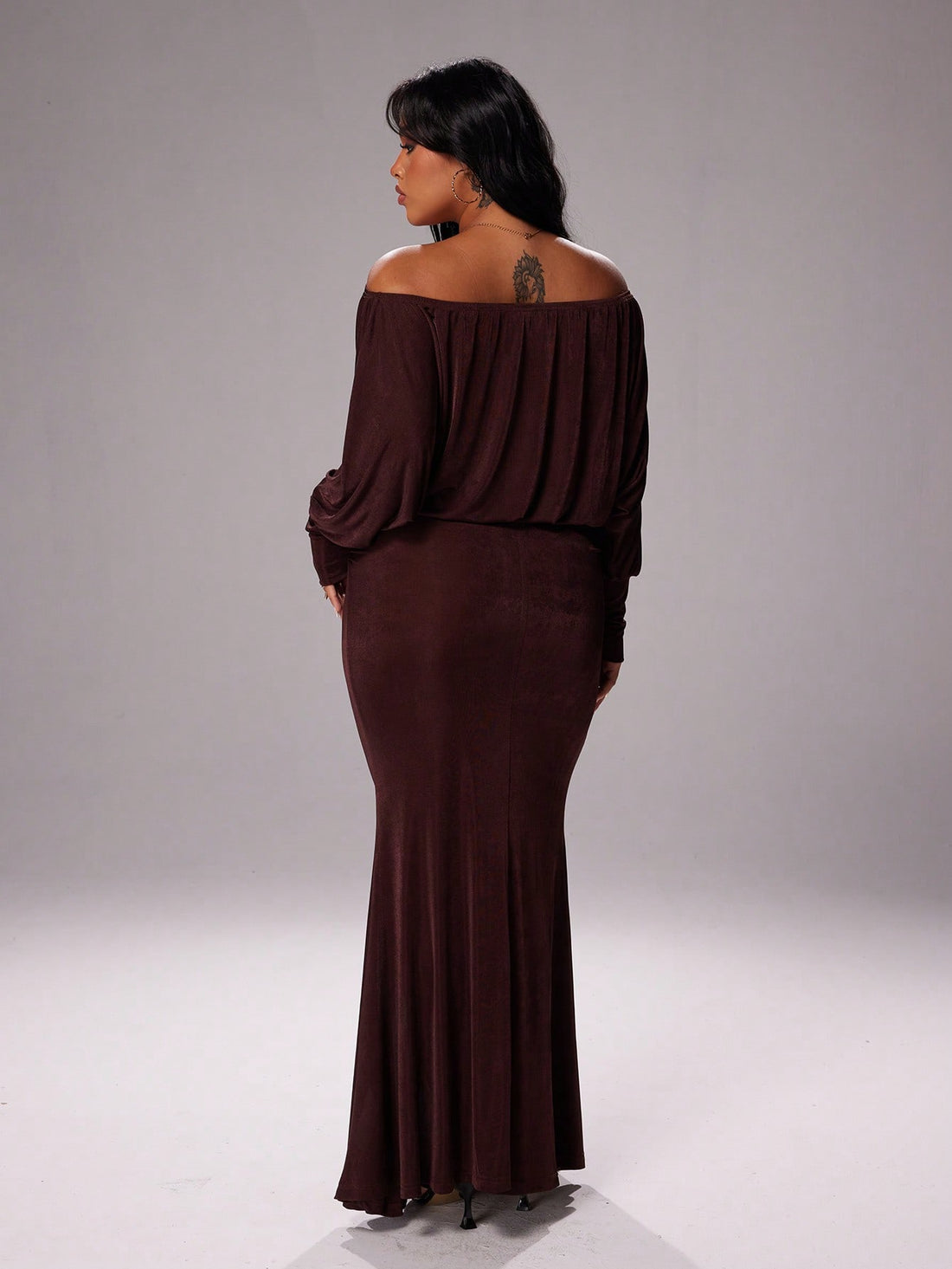 Turn heads at your next celebration in this stunning plus-size sequin dress that blends vintage charm with modern glamour. The shimmering brown sequins catch the light beautifully, while the romantic off-shoulder neckline and voluminous big sleeves create an effortlessly chic silhouette. Perfect for parties, date nights, or any occasion calling for a touch of sass and sparkle. Designed to flatter and celebrate your curves with confidence and style.