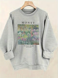 Detail view of Monet-Inspired Soft Beige Sweatshirt: Casual Art-Printed Pullover for All Seasons for everyday styling