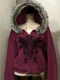 Front view of wine red hooded zip-up jacket with black wing graphic and faux-fur trim