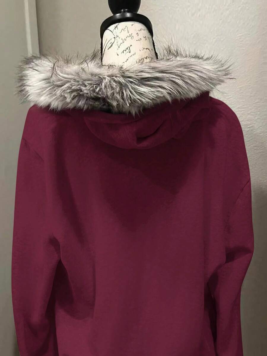 Back view of wine red hooded zip-up jacket with faux-fur trimmed hood