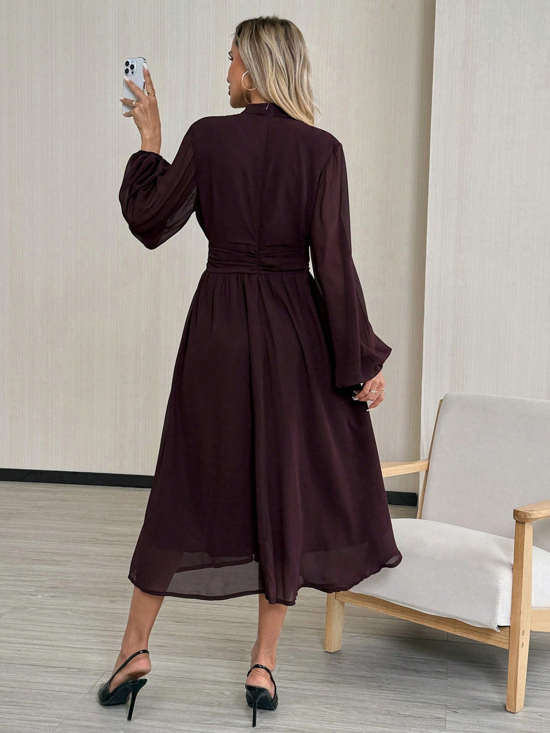 Step into autumn with effortless sophistication in this stunning chocolate brown maxi dress. The flattering A-line silhouette skims your curves beautifully, while charming lantern sleeves add a touch of vintage flair and movement. Perfect for transitioning from office meetings to weekend adventures, this versatile piece layers seamlessly under blazers or stands alone as a statement look. Rich, warm tones complement every skin tone, making it your go-to dress when you want to look polished without trying too