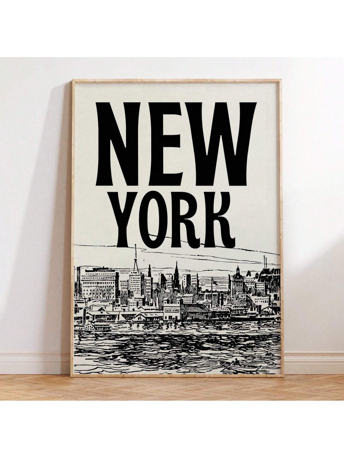 Transform your space into a Manhattan state of mind with this striking black and white New York cityscape poster. Featuring iconic skyscrapers and vintage charm, this frameless art piece brings urban sophistication to any room—whether you're decorating a living room, bedroom, or dorm. The timeless retro aesthetic pairs effortlessly with modern or eclectic decor, while the frameless design keeps things sleek and minimal. Perfect for NYC lovers and anyone craving that classic Big Apple vibe without the hefty 