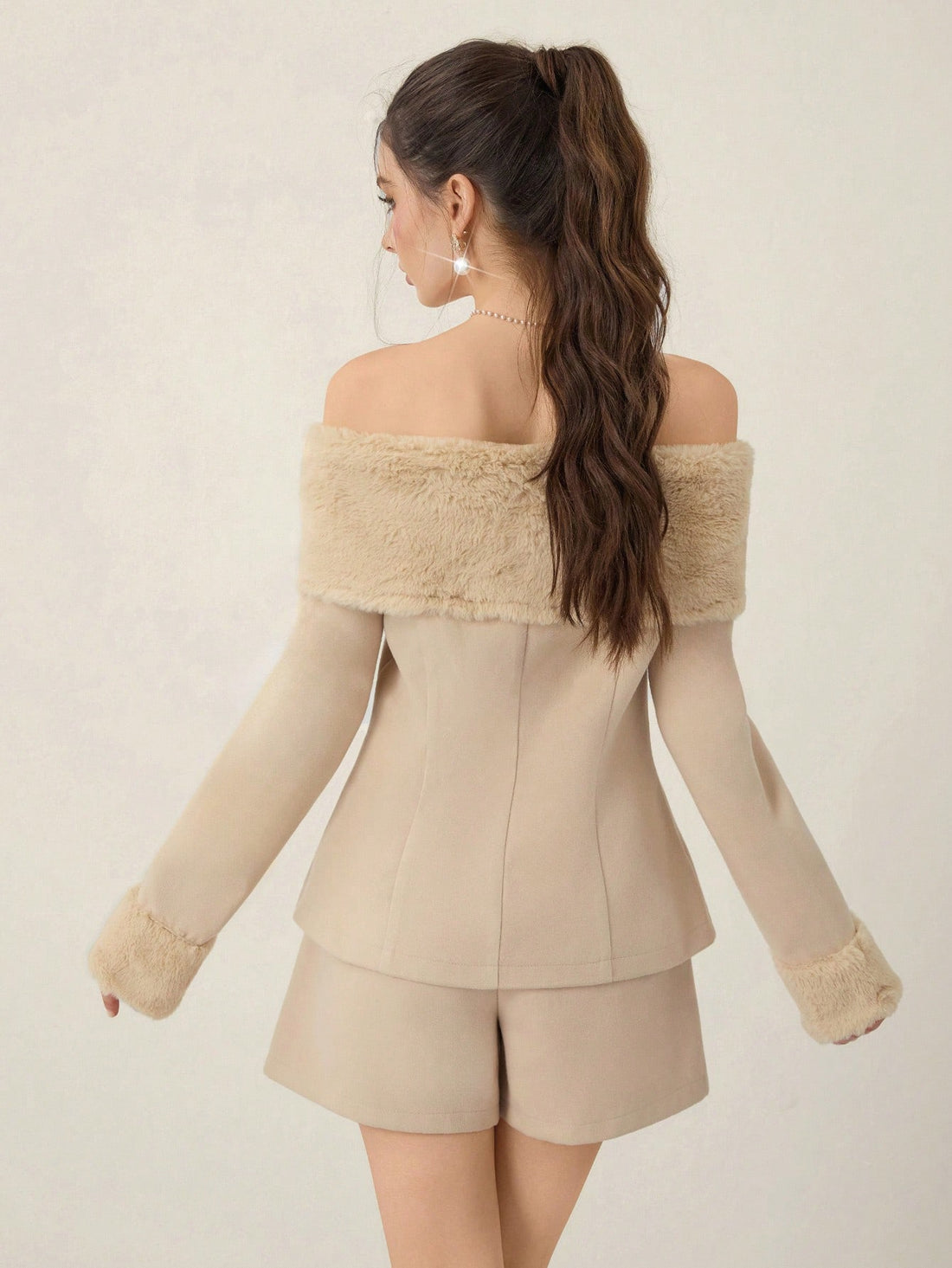 Discover effortless sophistication with this stunning off-shoulder wool blend top. The graceful A-line silhouette flatters every figure while the luxurious wool blend keeps you cozy through crisp autumn and winter days. Perfect for elevating casual outfits or dressing up for special occasions, this piece brings that coveted chic factor to your wardrobe. Whether you're heading to brunch or a night out, this versatile top is your new go-to for looking polished and put-together.