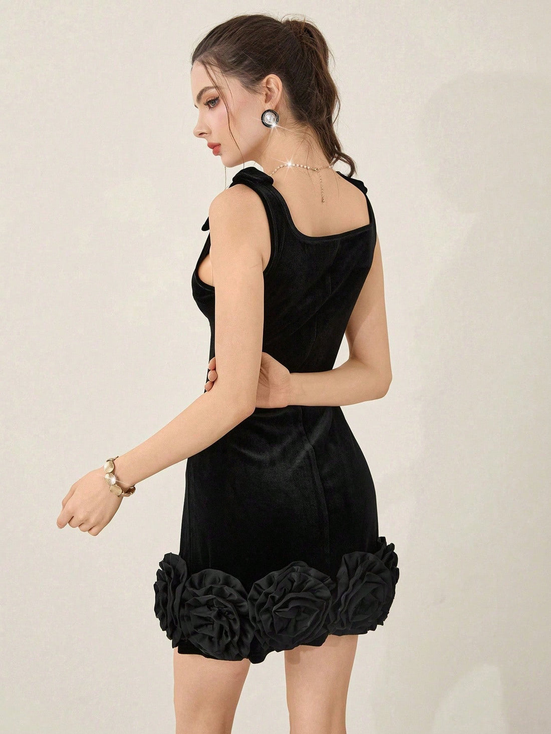 Make a statement at your next event in this show-stopping mini dress! Adorned with sparkling rhinestone details and eye-catching 3D floral embellishments, this dress transforms any occasion into a glamorous affair. The elegant bow accent adds a touch of sophistication while keeping things fun and flirty. Perfect for parties, formal gatherings, or whenever you want to turn heads and feel absolutely fabulous. Slip into luxury and let your style shine as bright as the rhinestones!