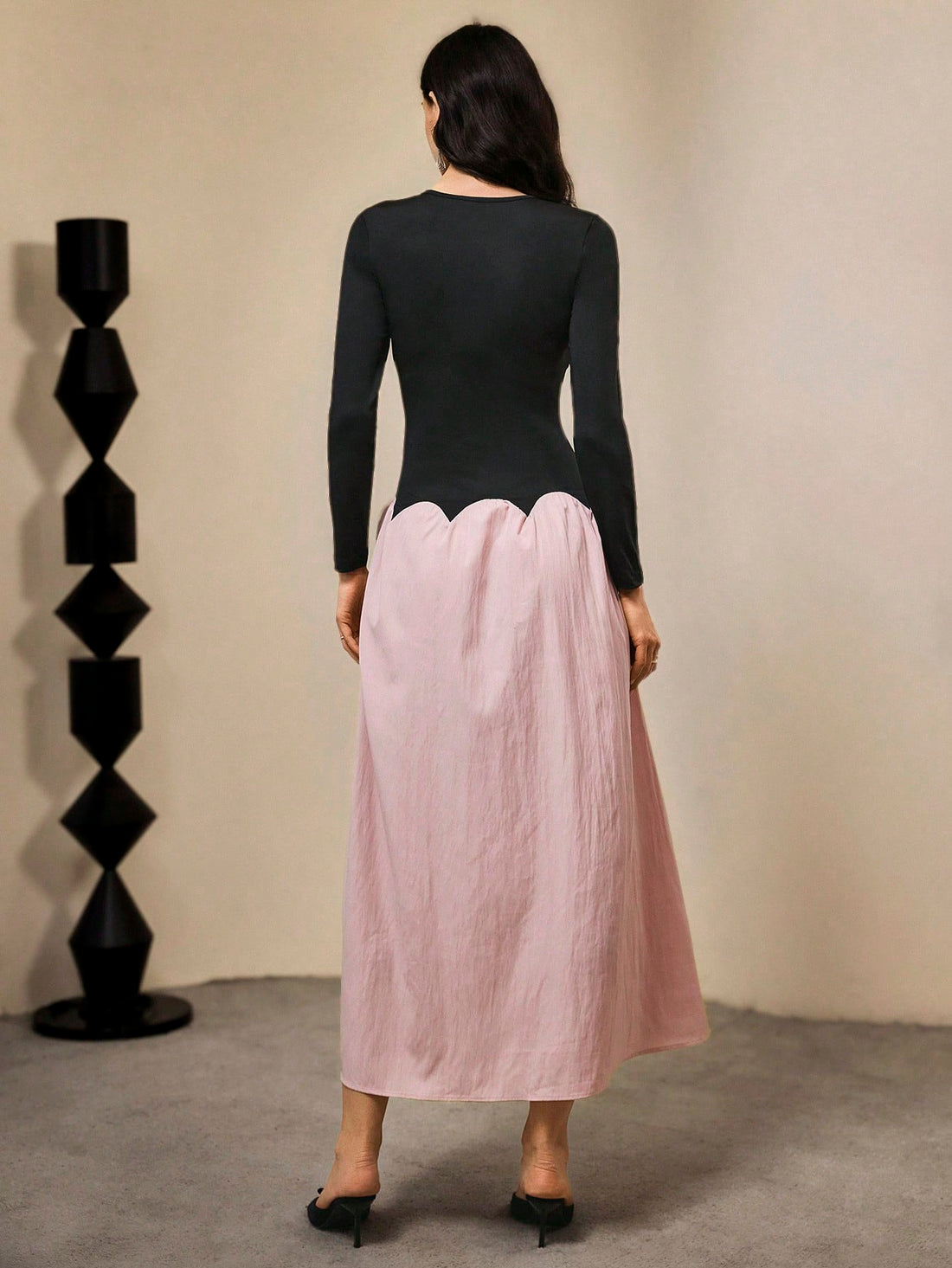 Make a statement in this stunning color block dress that perfectly blends sophistication with fun! Featuring a striking black and purple palette, this elegant piece showcases intricate 3D floral accents that add dimension and visual interest. The flowing silhouette is finished with a playful wavy hem that catches every step you take. Perfect for special occasions, evening events, or whenever you want to turn heads with effortless style. This dress proves that elegance doesn't have to be boring—it can be bol