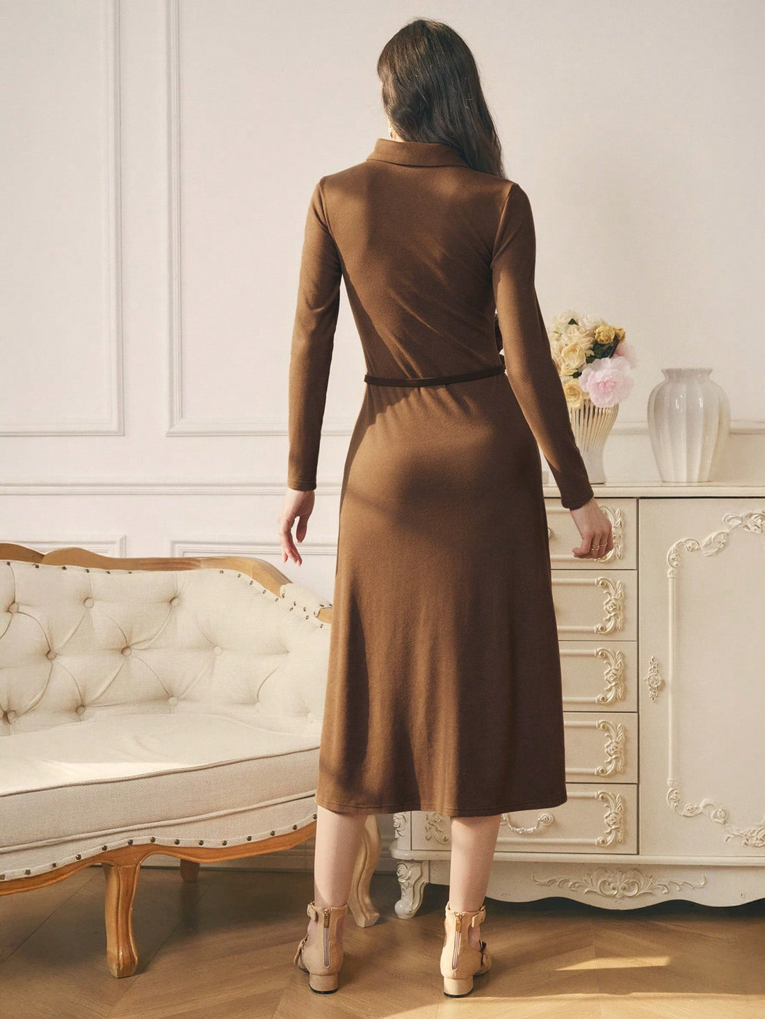 Twirl into the season in this stunning floral long dress that's as versatile as it is gorgeous. The intricate floral detailing brings elegance to any autumn or winter celebration, while the detachable belt lets you switch up your look in seconds—cinched for drama or removed for effortless flow. Whether you're heading to a holiday party or a special gathering, this dress delivers sophisticated style with a playful edge. Dress it up with heels and statement jewelry, or keep it casual for a refined everyday vi