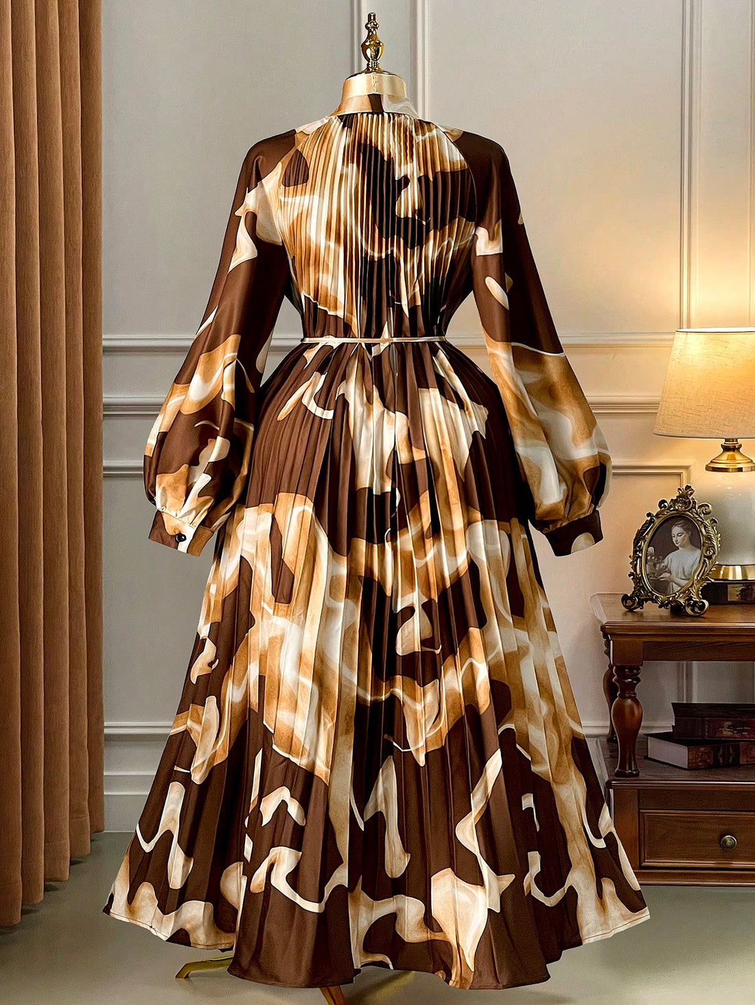 Embrace the season in style with this stunning plus-size midi dress that's equal parts sophisticated and fun! The rich brown base pairs beautifully with multicolor accents, creating a look that's anything but boring. Pleated detailing adds movement and dimension, while the extra-long sleeves provide cozy coverage perfect for crisp fall days. Whether you're heading to brunch or a casual gathering, this dress strikes that sweet spot between elegant and effortlessly chic. Celebrate your curves and your persona