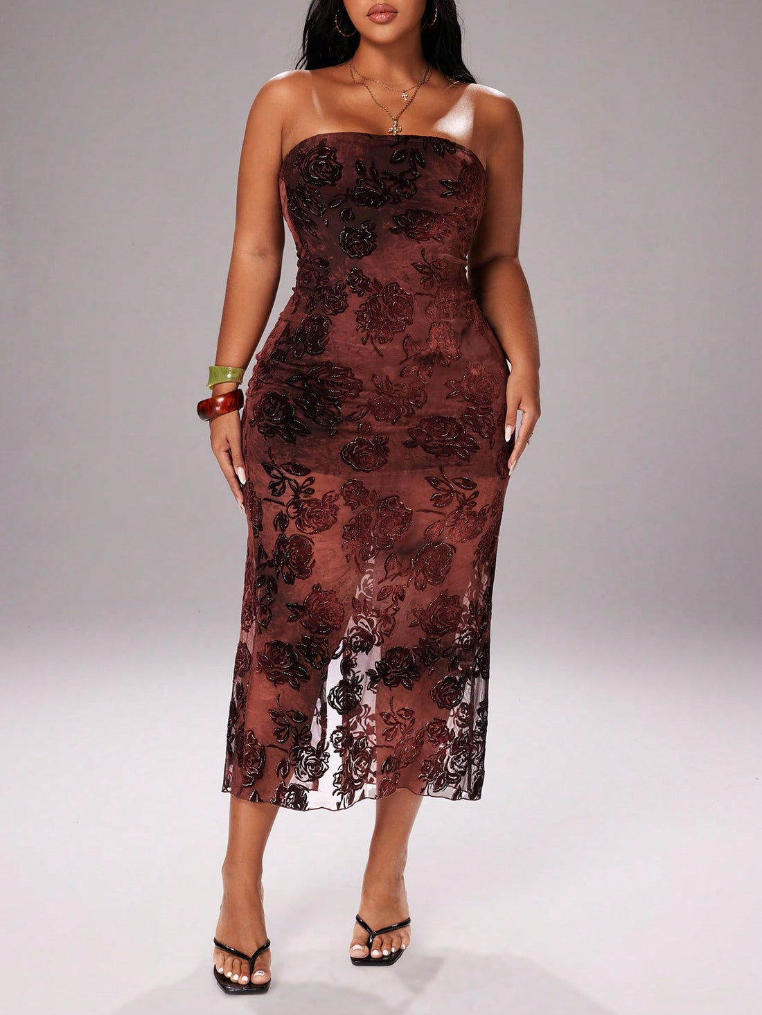 Slip into pure sparkle with this stunning vintage rose glitter strapless dress that hugs you in all the right ways. The fitted silhouette flatters your figure while the daring split hem adds a flirty touch of movement and sass. Delicate mesh flock detailing brings texture and dimension, making you shimmer from every angle. Perfect for nights when you want to turn heads and feel absolutely fabulous—this dress is your ticket to stealing the spotlight!