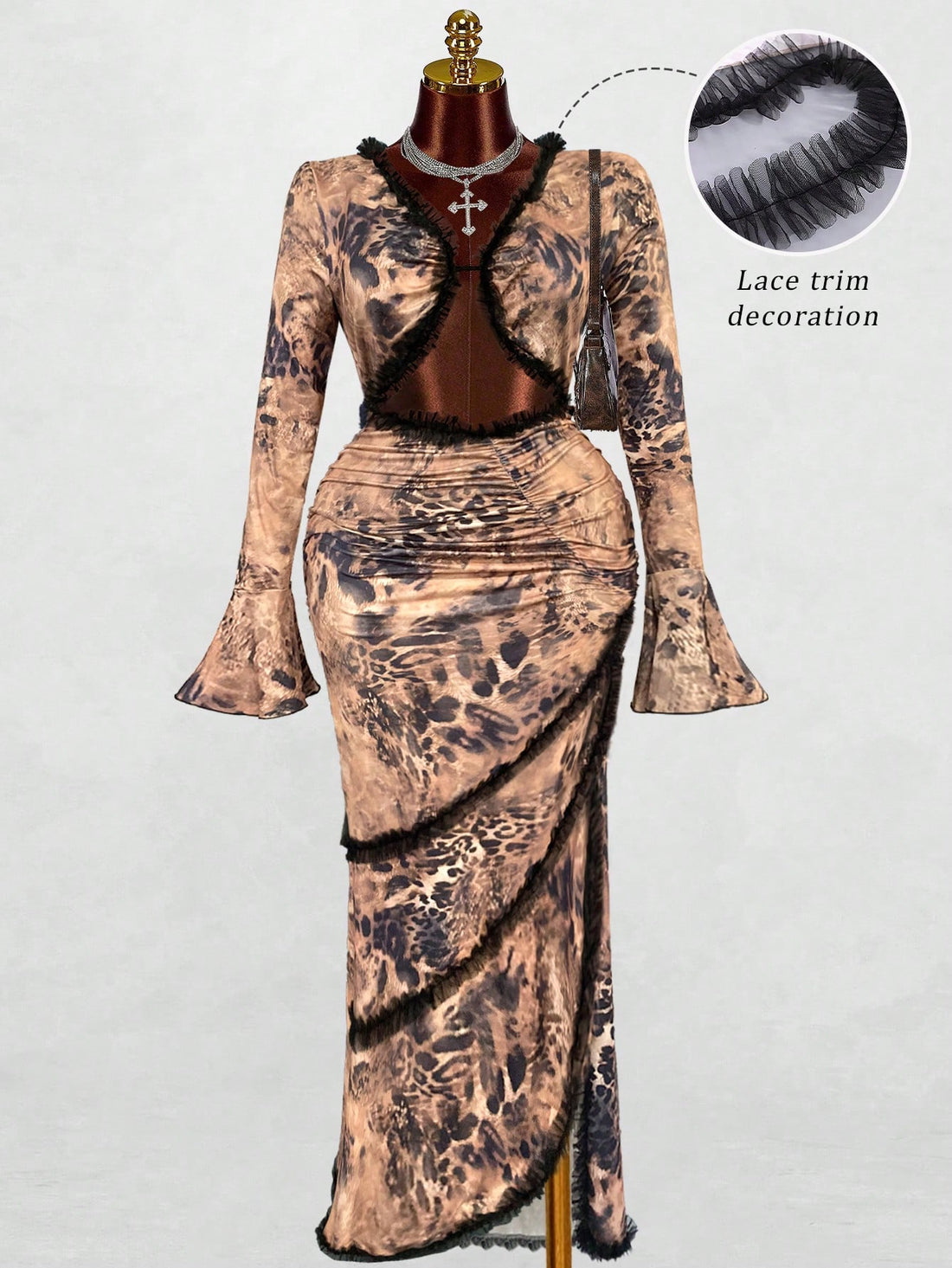 Turn heads in this bold leopard print flare sleeve dress that celebrates curves with confidence. The fitted silhouette hugs you in all the right places, while the dramatic fishtail hem adds a touch of glamorous flair. Fluttery bell sleeves frame your arms beautifully, making this the perfect statement piece for nights out or special occasions. Available in extended sizes because fabulous comes in every size. Roar into any room feeling like the main character you are.