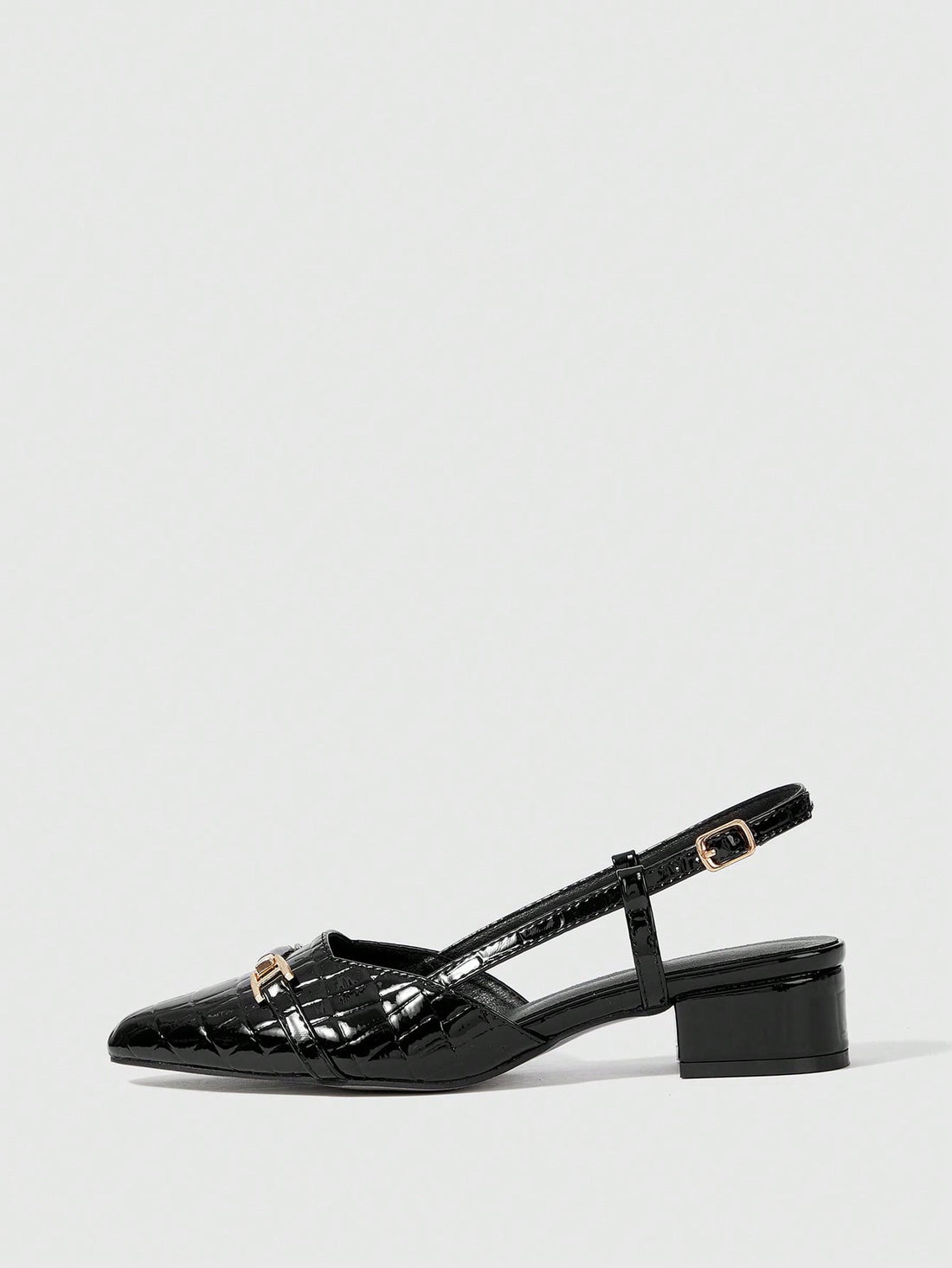Step into sophistication with these stunning pointed-toe pumps that demand attention. The sleek silhouette elongates your legs while the eye-catching metal buckle accent adds just the right amount of edge and glamour. Perfect for elevating your everyday look or turning heads at special occasions, these high heels deliver confidence with every stride. Whether you're conquering the boardroom or the dance floor, these versatile pumps are your secret weapon for looking absolutely fabulous.
