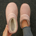 Overhead pair view of pink slip-on ankle boots with rounded toes