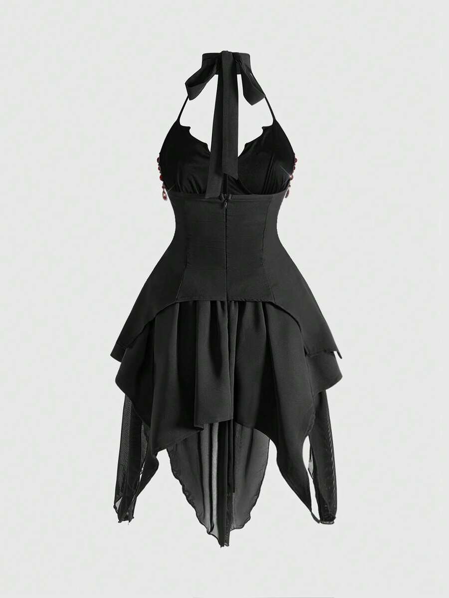 Front view of black gothic halter mini dress with red rhinestone detail and layered asymmetric skirt
