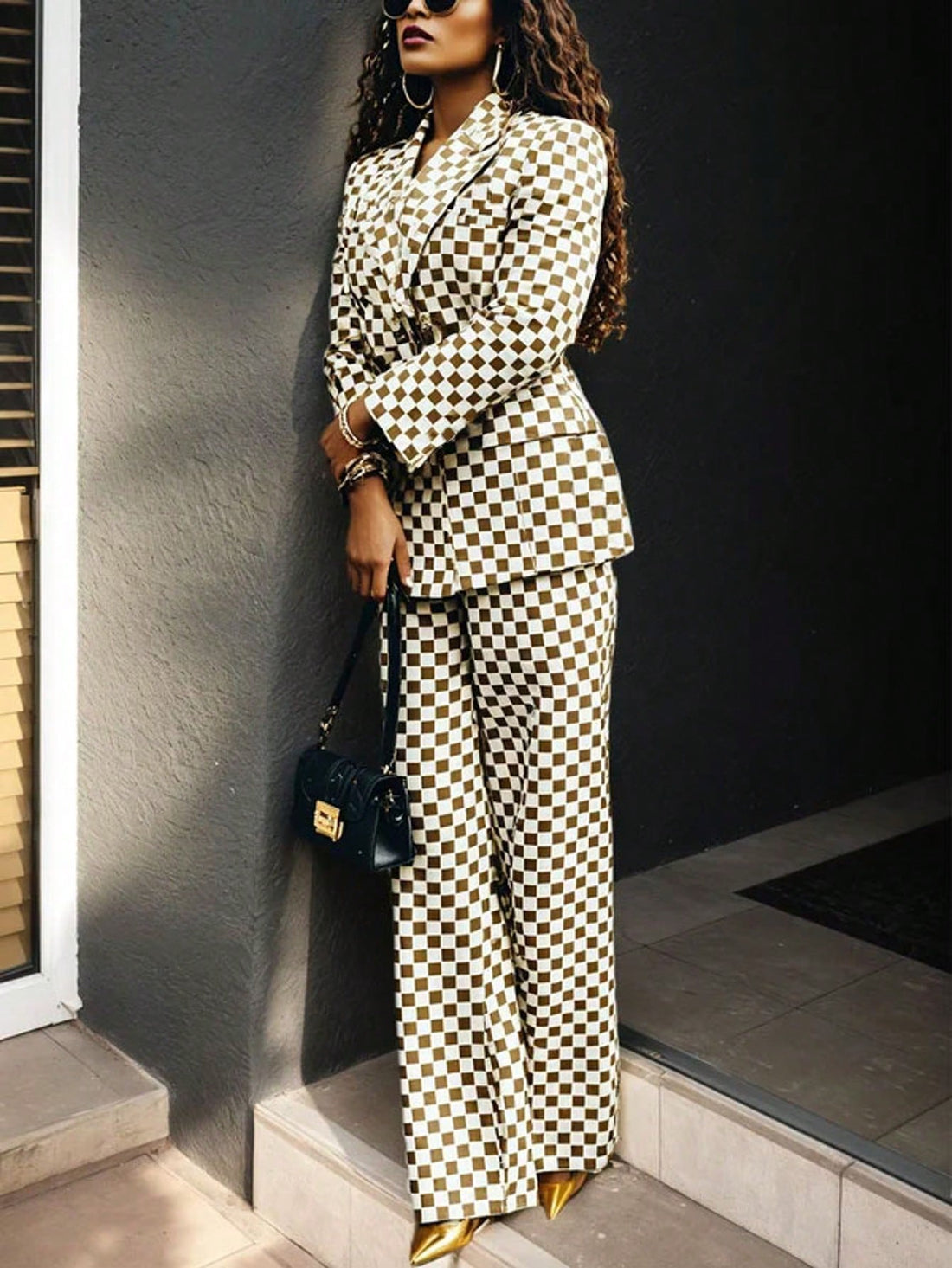 Master the art of effortless style with this versatile two-tone checkerboard button-up! Featuring a timeless pattern that plays beautifully with light and shadow, this shirt transitions seamlessly from weekend brunch to boardroom meetings to night-out vibes. The classic button-front design pairs with quality construction that keeps you looking polished through every season. Whether you're layering it over a tee or wearing it solo, this wardrobe MVP delivers endless outfit possibilities. Comfort meets chic—b