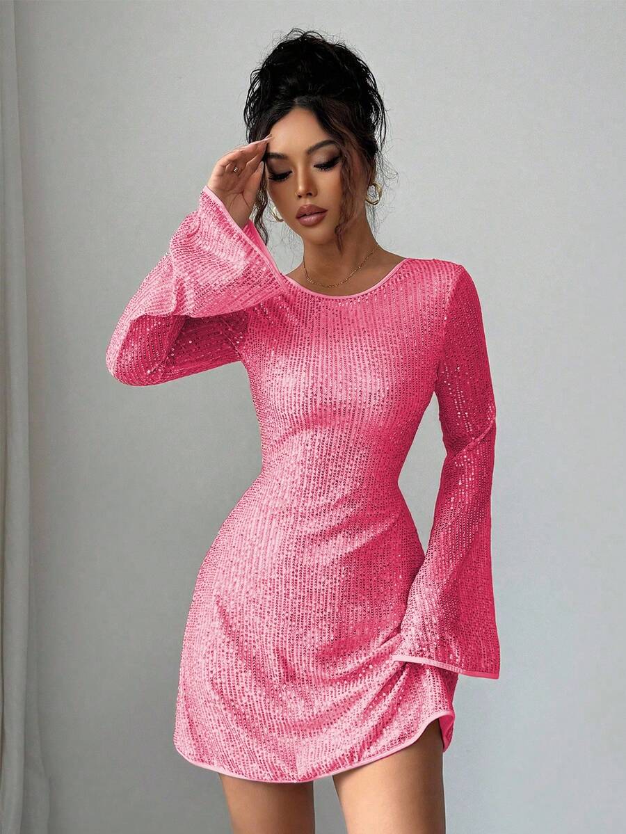 Shimmer and shine in this stunning apricot sequin mesh dress that's guaranteed to turn heads at any celebration. The backless design adds a touch of daring elegance, while the shimmering sequins catch the light with every move. Whether you're celebrating a birthday bash or attending a wedding, this dress delivers show-stopping style that feels both sophisticated and fun. The delicate mesh construction creates a flattering silhouette that works beautifully for special occasions. Slip into this showstopper an