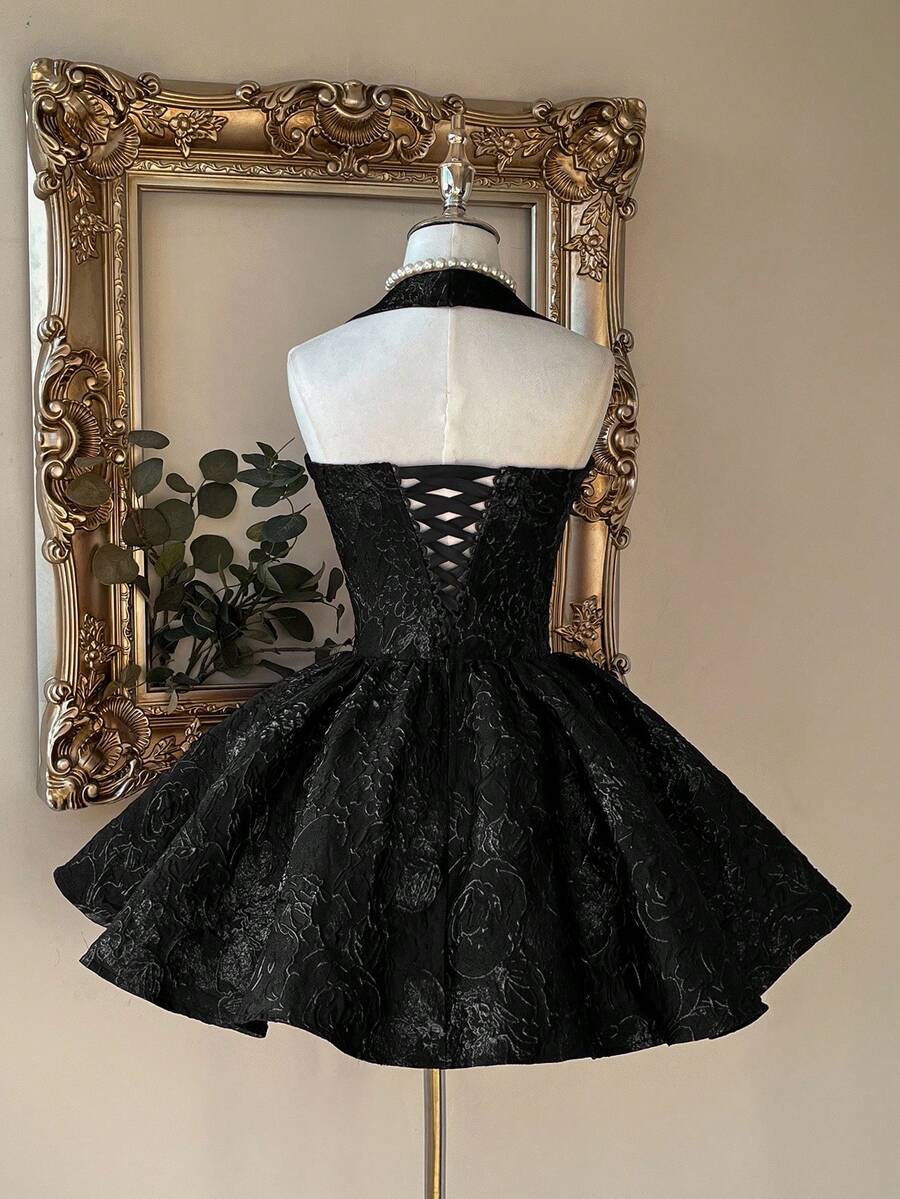 Shop an elegant jacquard halter neck A line dress with a backless design. A refined choice for weddings, parties, and special occasions.