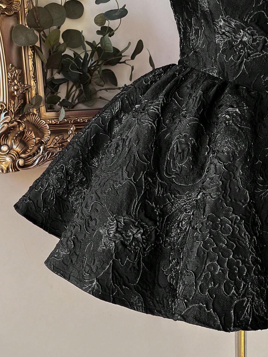 Shop an elegant jacquard halter neck A line dress with a backless design. A refined choice for weddings, parties, and special occasions.