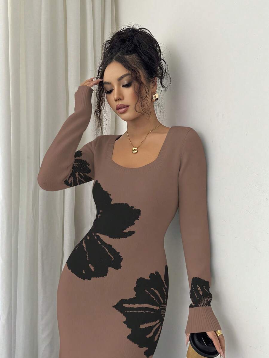 Close front view of taupe and black floral sweater dress with ribbed square neckline and cuffs
