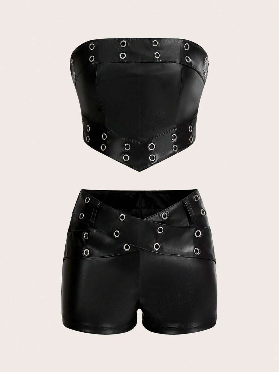 Front flat-lay view of black faux-leather bandeau and angled-waist shorts set