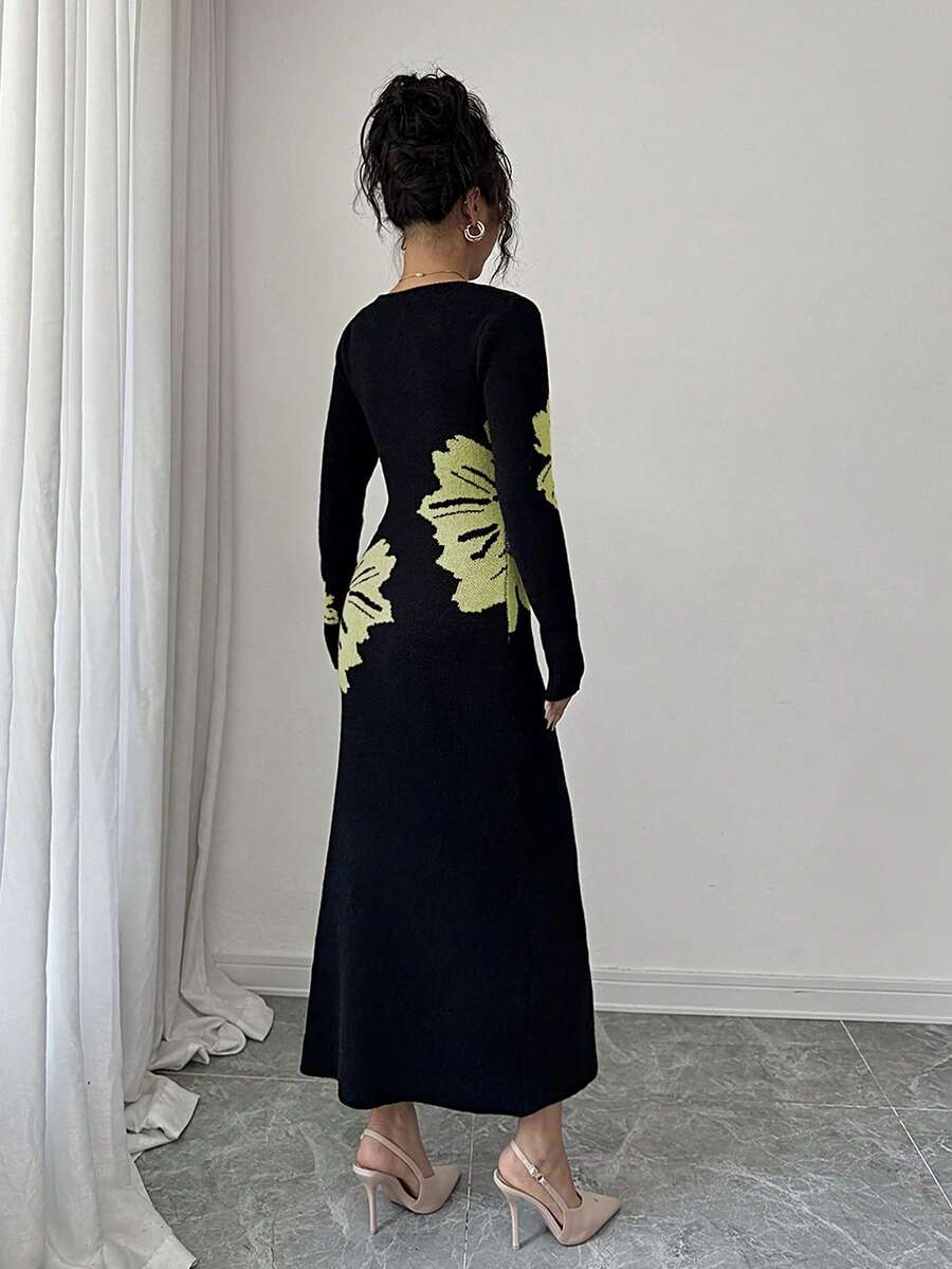 Back full view of black and pale lime floral slim-fit knit midi dress with subtly flared hem