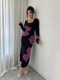 Front full view of black and mauve floral square-neck bodycon knit midi dress with long sleeves