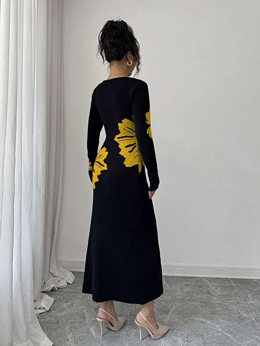 Back full view of black and mustard floral slim-fit knit midi dress with subtly flared hem