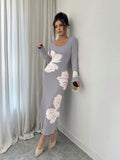 Front full view of light grey and cream floral square-neck bodycon knit midi dress with long sleeves