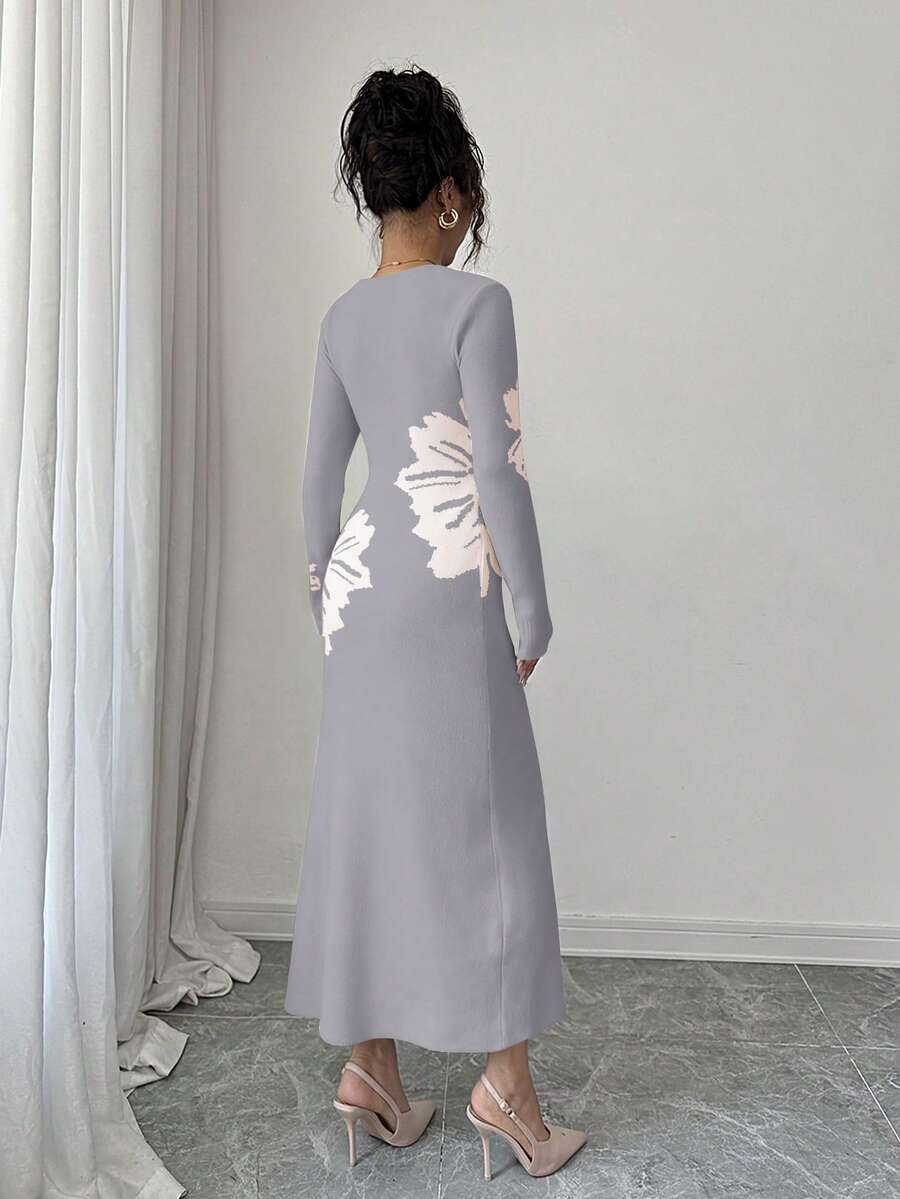 Back full view of light grey and cream floral slim-fit knit midi dress with subtly flared hem
