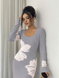 Close front view of light grey and cream floral sweater dress with ribbed square neckline and cuffs
