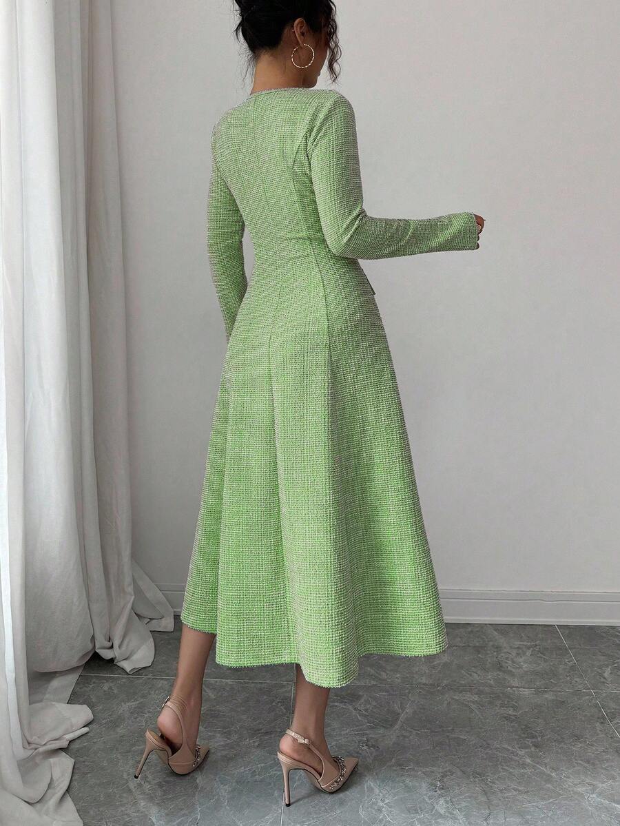 Elevate your wardrobe with this charming blue-green midi dress that strikes the perfect balance between polished and playful. The flattering A-line silhouette skims your curves beautifully, while the ruffled collar adds a touch of vintage-inspired flair. Adorned with delicate faux pearl buttons down the front, this dress transitions seamlessly from the classroom to date night. Whether you're impressing colleagues or turning heads on a romantic evening, this versatile piece proves that timeless elegance neve