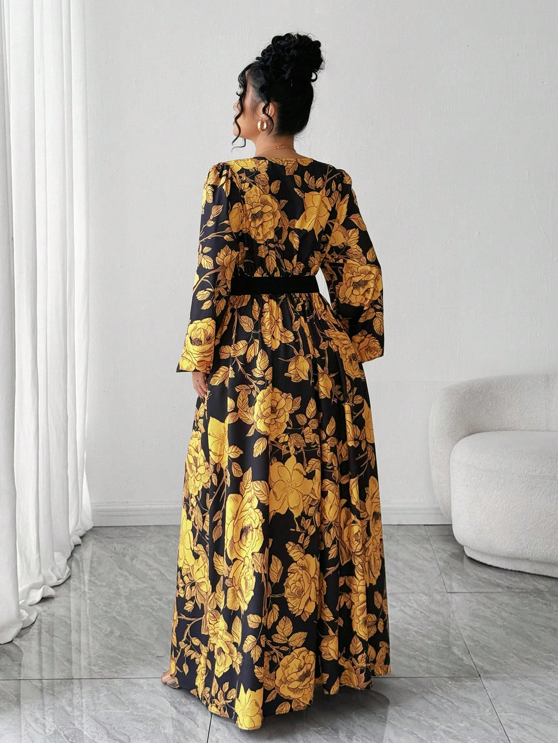 Bloom into confidence with this stunning plus-size floral dress that's equal parts romantic and ready-to-go. The vibrant print brings life to any occasion, while the tie waist cinches just right for a flattering silhouette. Delicate ruffle trim adds a playful touch that says "I woke up like this"—even if you didn't. Long, flowing fabric moves with you, making every step feel effortless. Perfect for brunch dates, garden parties, or whenever you want to feel absolutely fabulous in your own skin.