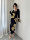 Front full view of black and beige floral square-neck bodycon knit midi dress with long sleeves