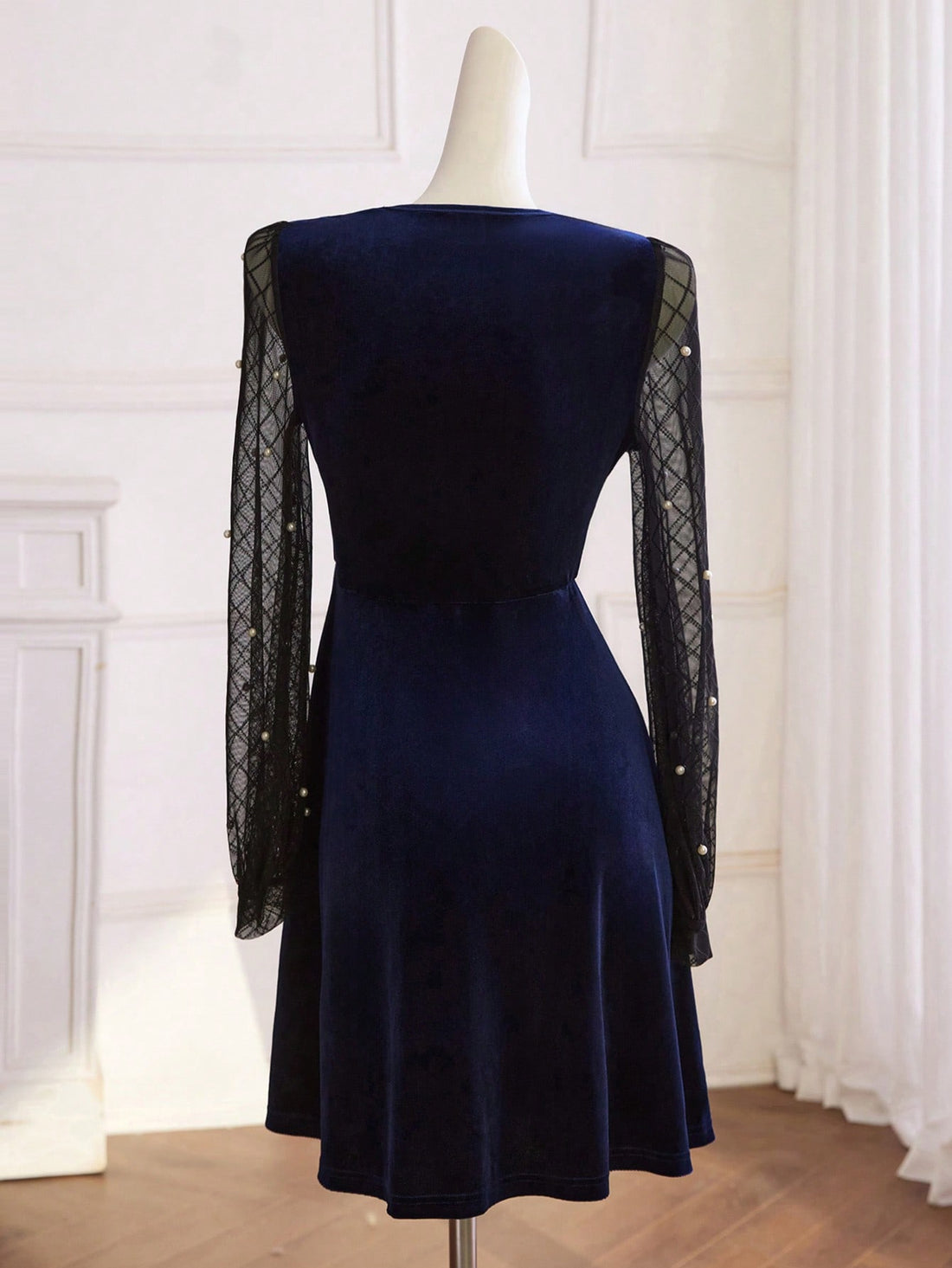 Shimmer into the season with this show-stopping sequin mesh mini dress that's equal parts vintage glamour and modern sass. The delicate A-line silhouette flatters every figure while thousands of shimmering sequins catch the light with every twirl. Perfect for autumn galas, winter cocktail parties, or anywhere you want to turn heads, this dress pairs effortlessly with heels and attitude. Whether you're dancing till dawn or making a grand entrance, this playful piece proves that vintage charm never goes out o