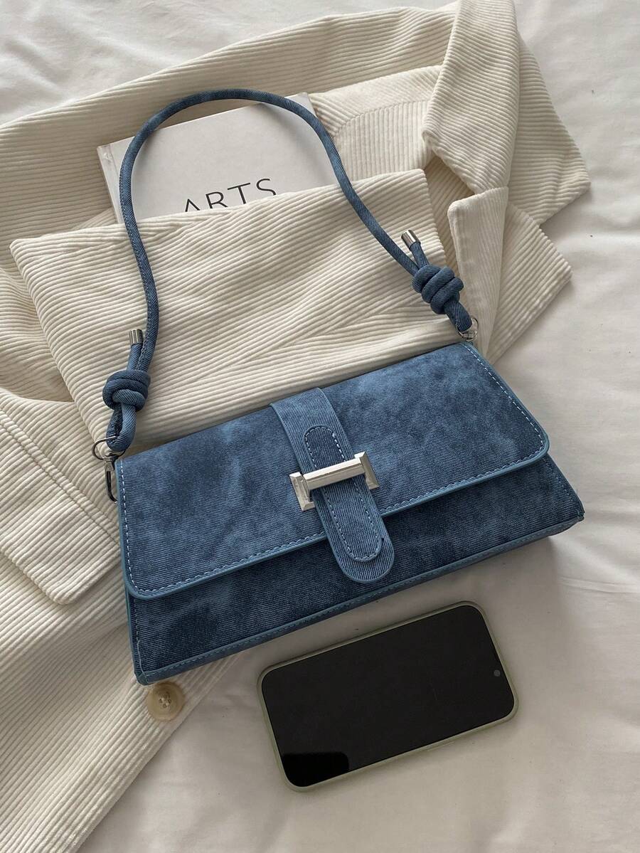 Elevate your look with this metal decor handbag for women, designed to bring modern elegance to both everyday outfits and special occasions. Featuring polished metallic accents and a sleek structured silhouette, this versatile handbag offers the perfect blend of sophistication, functionality, and contemporary style.