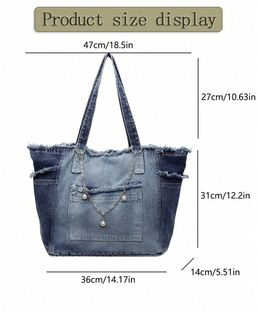 Carry your essentials in style with this eye-catching denim tote that's part practical, part fashion statement. The standout chain embellishment adds an edgy-chic vibe perfect for elevating your everyday look, whether you're heading to work, running errands, or meeting friends. Spacious enough for your laptop, groceries, or weekend adventures, this versatile bag transitions seamlessly from casual to polished. Durable denim construction keeps up with your on-the-go lifestyle while the trendy hardware detail 