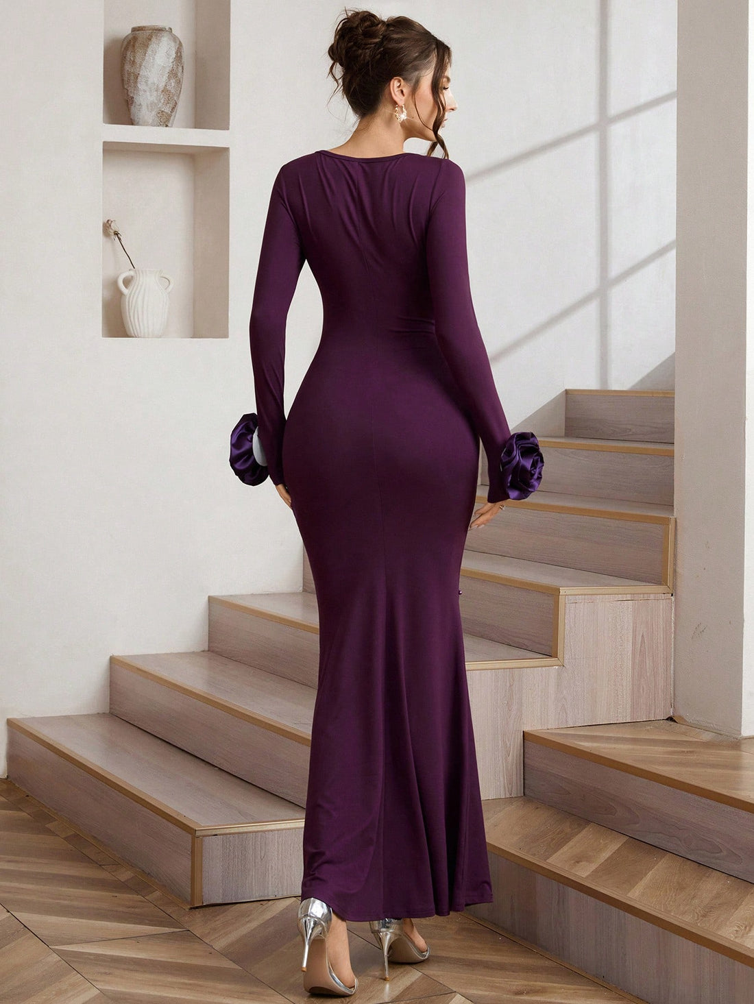 Elevate your autumn-winter wardrobe with this stunning floral embellished dress that's equal parts sophisticated and fun. The graceful boat neckline frames your shoulders beautifully, while the asymmetric hem adds a modern twist that keeps things interesting. Perfect for holiday parties, special dinners, or any gathering where you want to turn heads. The intricate floral details bring just the right amount of sparkle without overwhelming your look. Slip into this dress and feel the confidence that comes wit