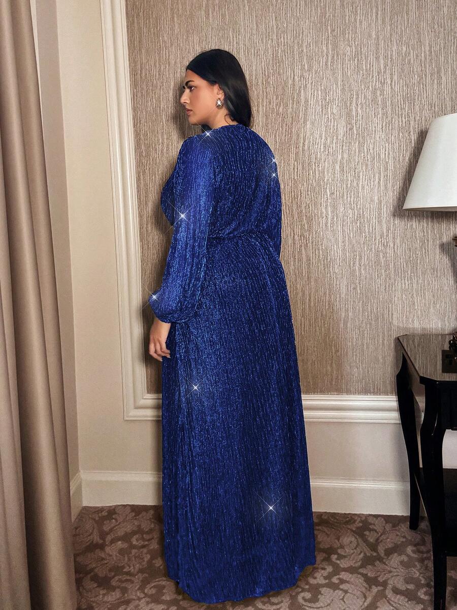 Make a statement in this stunning plus-size dress that's equal parts sophisticated and fun! The plunging V-neckline draws the eye while romantic lantern sleeves add movement and flair. A cheeky split hem keeps things flirty without sacrificing elegance. Whether you're dancing at a wedding, turning heads at a party, or stealing kisses on a romantic escape, this dress delivers the confidence and style you deserve. Flattering, fabulous, and ready for your moment to shine.