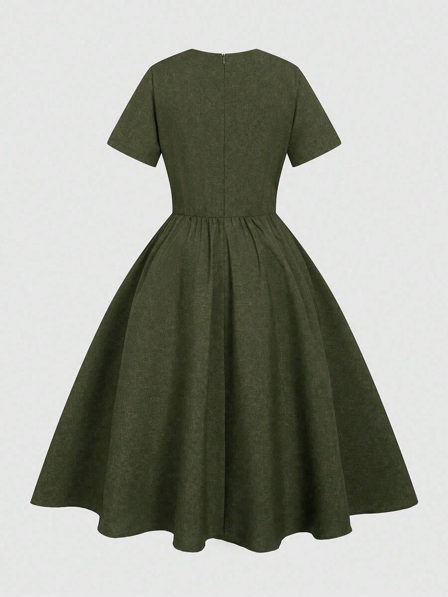 Embrace your best self in this charming vintage-inspired dress that celebrates curves with effortless grace. Featuring classic button-front detailing and breezy short sleeves, it's your go-to piece for warm-weather adventures. The relaxed fit flatters beautifully while the timeless design keeps you looking polished from brunch to sunset strolls. Perfect for those who love retro vibes with modern comfort—because style should feel as good as it looks!