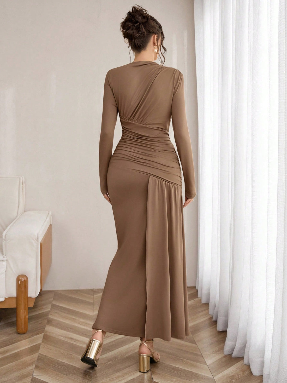 This stunning pleated asymmetric gown brings sophisticated drama to any formal occasion. The cinched waist creates a flattering silhouette while cascading pleats add movement and elegance. Perfect for weddings, galas, and unforgettable evenings, this dress commands attention with its modern design and timeless appeal. Slip into something extraordinary and let your confidence shine as bright as the moment itself.