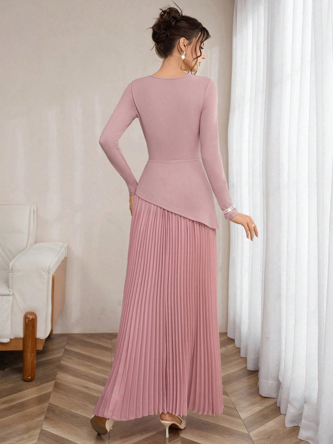 Step into the spotlight in this stunning pink maxi dress that effortlessly blends vintage charm with modern elegance. The graceful A-line silhouette flatters every figure, while delicate pearl accents add a touch of sophistication and sparkle. Perfect for date nights, cocktail parties, or any occasion where you want to feel absolutely radiant. The flowing fabric moves beautifully with you, creating an enchanting presence that turns heads. Whether you're dancing the night away or enjoying an intimate dinner,