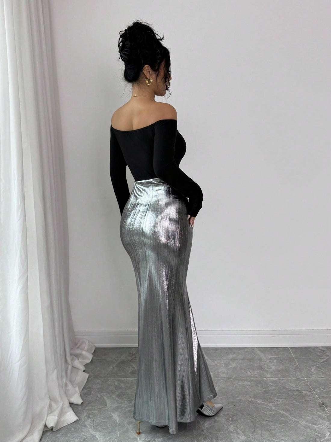 Turn heads in this stunning off-shoulder color block dress that effortlessly blends sophistication with fun. The fitted silhouette hugs your curves just right, while playful ruffles add movement and personality to the long sleeves. Bold color blocking creates visual interest and flatters every figure. Whether you're heading to brunch, a night out, or making a statement at any occasion, this chic piece delivers style that feels both polished and playfully confident. A wardrobe essential that proves you don't