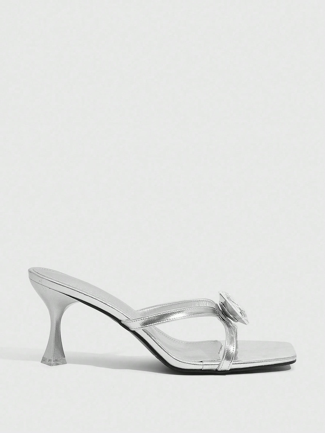 Step into sophistication with these stunning silver criss-cross high heel sandals, where elegance meets eye-catching sparkle. The intricate glass embellishments catch the light beautifully, adding a touch of glamour to any outfit. Designed with a flattering criss-cross strap detail, these heels offer both style and comfort for nights out, special occasions, or whenever you want to feel fabulous. Perfect for elevating your wardrobe with a shoe that's equal parts chic and show-stopping.