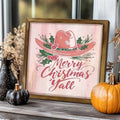 Merry Christmas Yall gold framed canvas on a festive tabletop