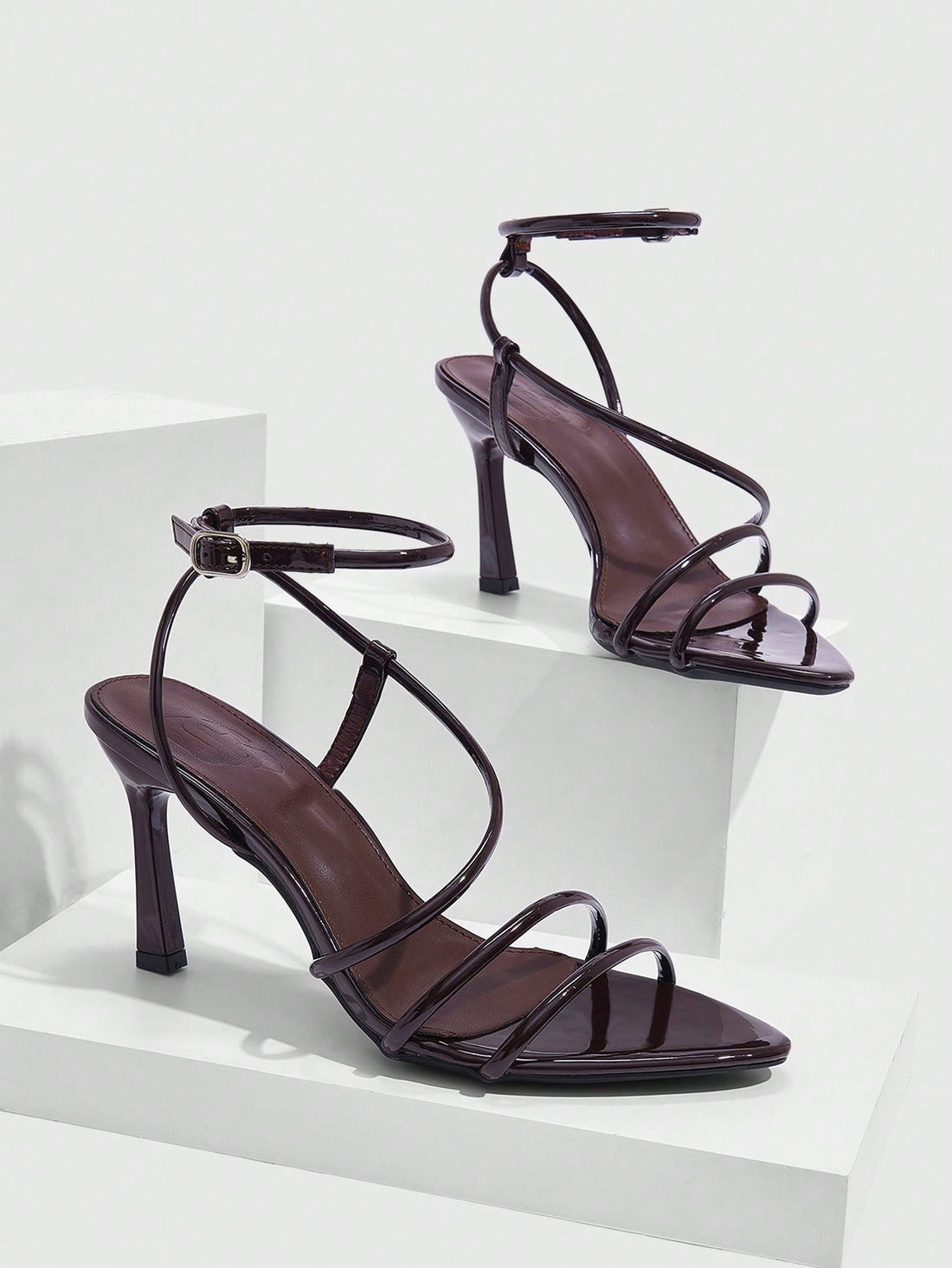 Step into the season with these stunning pointed-toe buckle sandals that blend elegance with festive flair. Featuring sleek high heels and a chic buckle detail, they're the perfect finishing touch for holiday parties, dinners, and celebrations. The pointed silhouette elongates your legs while the secure buckle keeps you comfortable all night long. Whether you're dancing at a Christmas gathering or making a grand entrance, these sandals deliver sophisticated style that turns heads. Dress them up with evening