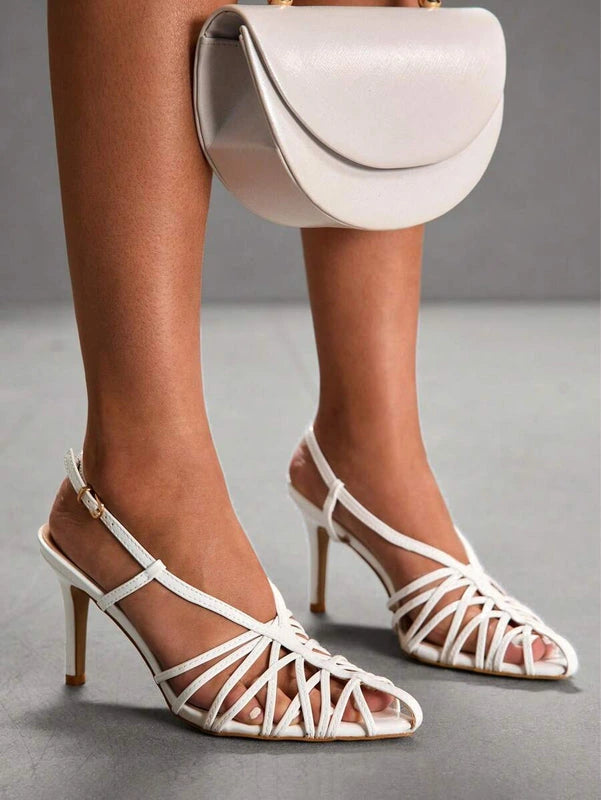 Strut through the season in style with our Elegant Commuter Heeled Sandals—the footwear equivalent of having it all! These beautifully crafted sandals blend polished sophistication with everyday wearability, making them your new go-to for everything from Monday morning meetings to holiday parties. The perfectly pitched heel adds just enough glamour without sacrificing comfort during your commute, while the timeless design works with virtually any outfit in your closet. Whether you're gifting them or treatin